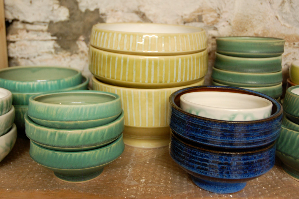 Expert potter at work in professional studio crafting ceramics